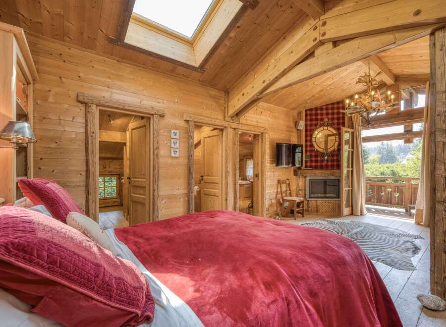 Experience rustic luxury in this stunning bedroom.