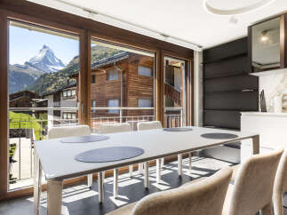 Experience breathtaking mountain views from this stunning property.