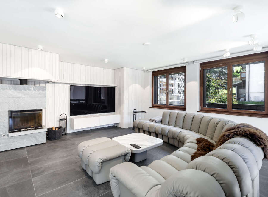 Experience modern luxury in this stunning living room.