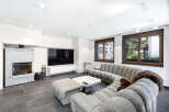 Experience modern luxury in this stunning living room.