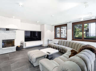 Experience modern luxury in this stunning living room.