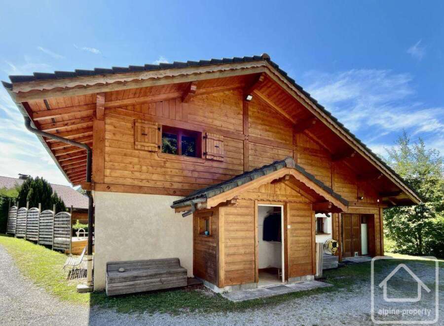 Discover this charming wooden chalet nestled in a serene environment.