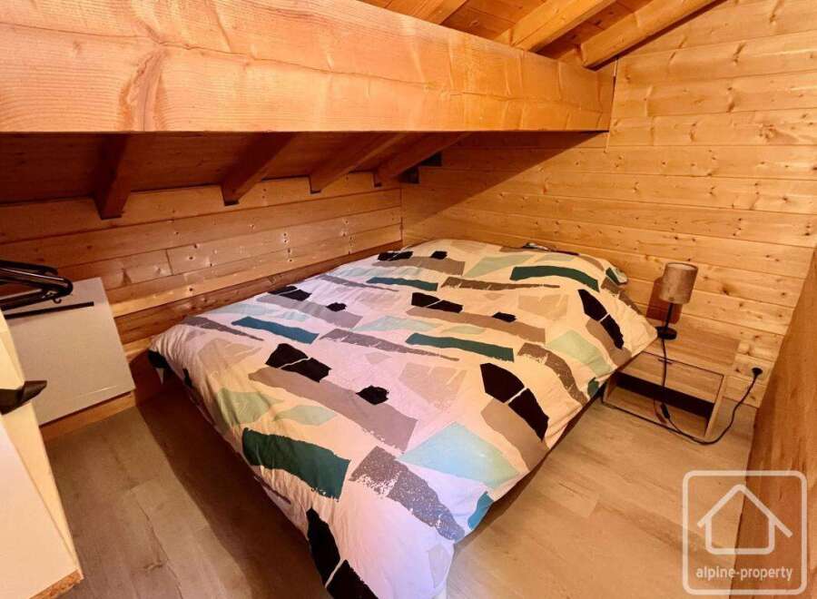 Discover the charm of this cozy bedroom, perfect for a relaxing retreat.