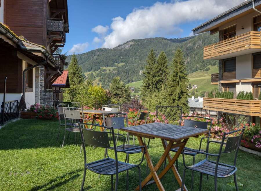 Enjoy breathtaking mountain views from this charming property.