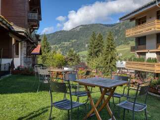 Enjoy breathtaking mountain views from this charming property.