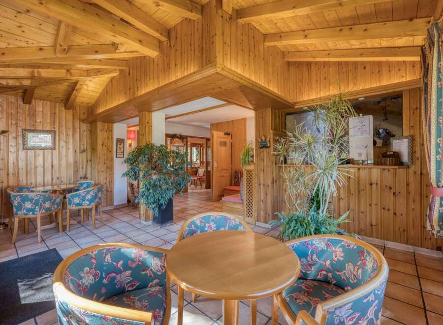 Step into a warm and inviting space with this charming interior.