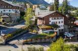 Nestled in a picturesque village, this charming property boasts traditional architecture and stunning mountain views.