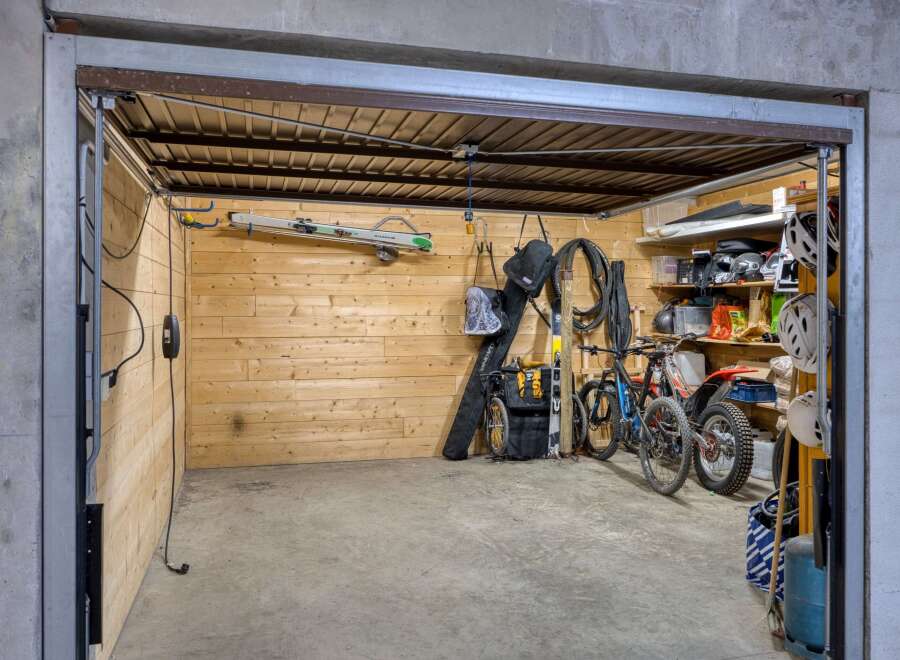 This garage offers ample storage space for all your recreational gear.