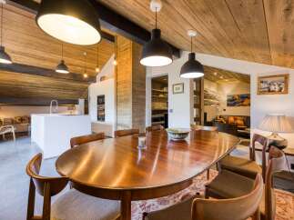 This stunning property boasts a beautifully designed dining area, perfect for hosting gatherings.