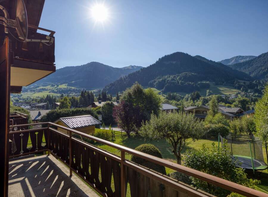 Enjoy breathtaking mountain views from this charming property.
