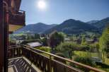 Enjoy breathtaking mountain views from this charming property.