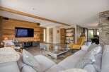 Experience luxury living in this stunning property, featuring a spacious living room with a modern design.