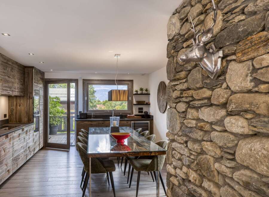 This stunning property boasts a unique blend of rustic charm and modern elegance.