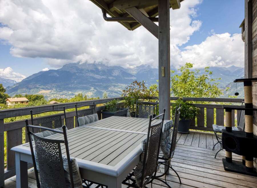 Enjoy breathtaking mountain views from this stunning outdoor deck.