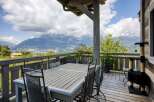 Enjoy breathtaking mountain views from this stunning outdoor deck.