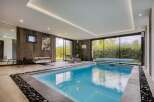 Indulge in luxury with this stunning indoor pool, perfect for year-round enjoyment.