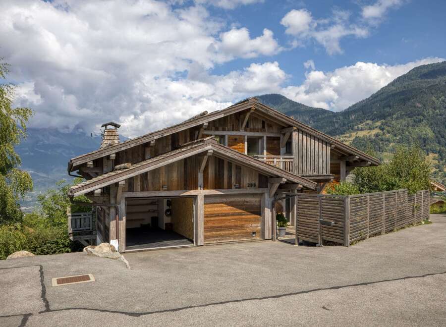 This stunning wooden chalet offers a perfect blend of rustic charm and modern convenience.