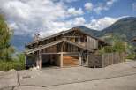 This stunning wooden chalet offers a perfect blend of rustic charm and modern convenience.