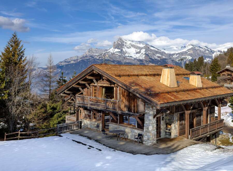 This stunning chalet offers a luxurious mountain retreat with breathtaking views.