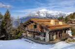 This stunning chalet offers a luxurious mountain retreat with breathtaking views.