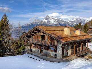 This stunning chalet offers a luxurious mountain retreat with breathtaking views.