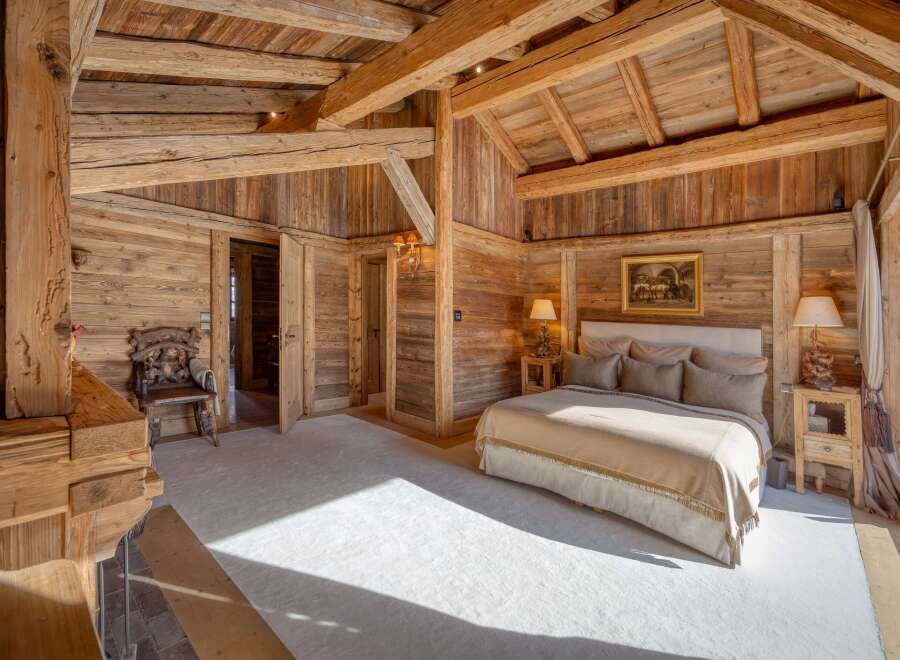 Step into rustic elegance with this stunning wooden bedroom.