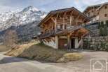 Discover a stunning chalet nestled in the heart of the mountains, offering breathtaking views and luxurious living.