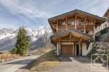 Discover the charm of this stunning wooden chalet nestled in the heart of the mountains.