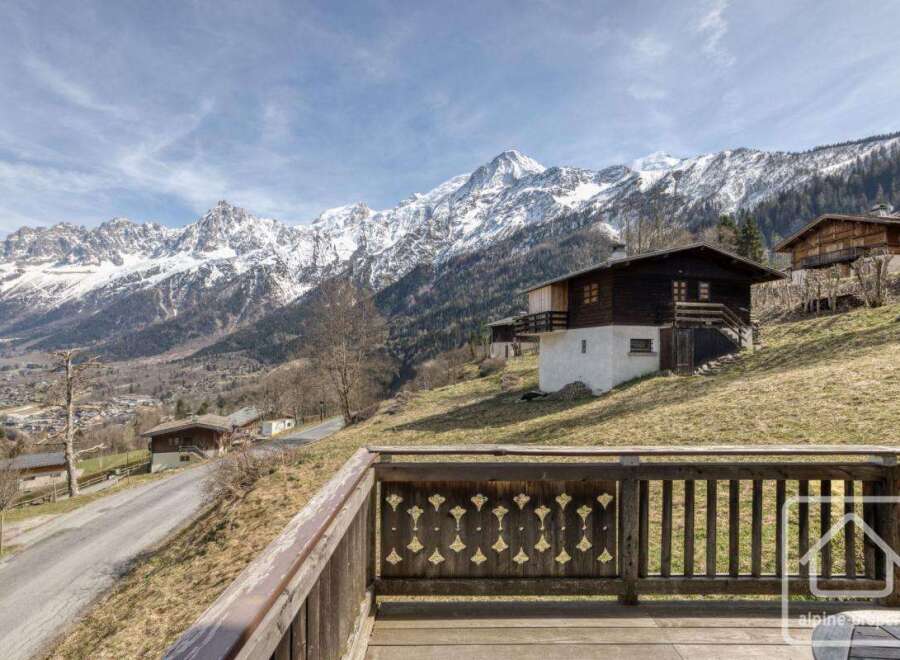 Experience the charm of this stunning mountain chalet, boasting breathtaking views of snow-capped peaks.