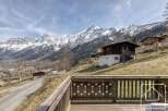 Experience the charm of this stunning mountain chalet, boasting breathtaking views of snow-capped peaks.