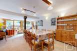 This spacious dining area is perfect for entertaining guests.