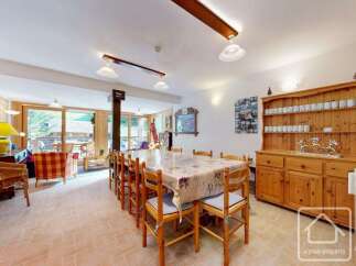 This spacious dining area is perfect for entertaining guests.