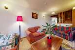 Discover the charm of this inviting living space, perfect for relaxation and entertaining.