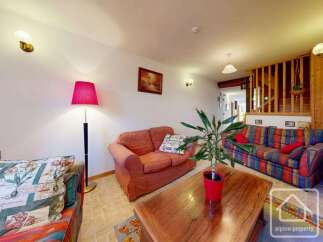 Discover the charm of this inviting living space, perfect for relaxation and entertaining.
