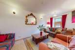 Discover the charm of this inviting living space, perfect for relaxation and entertaining.