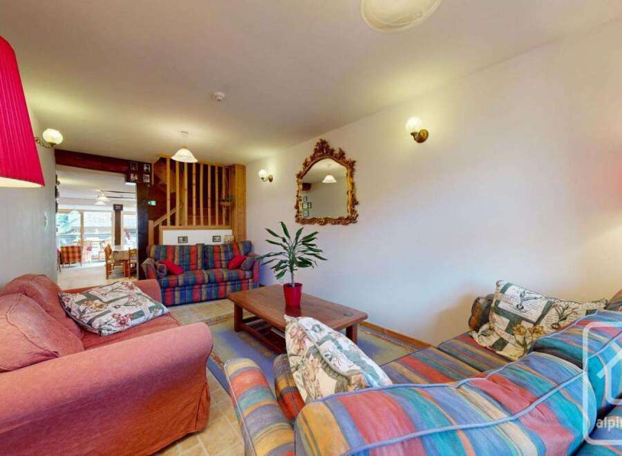 Step into a cozy living space, perfect for relaxation and entertaining.