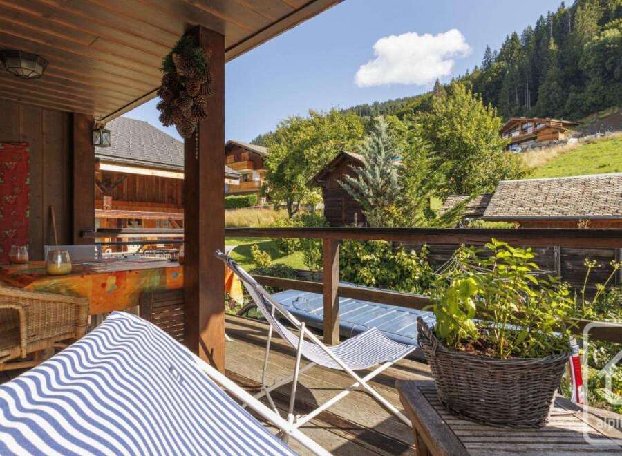 Enjoy breathtaking mountain views from this charming property.