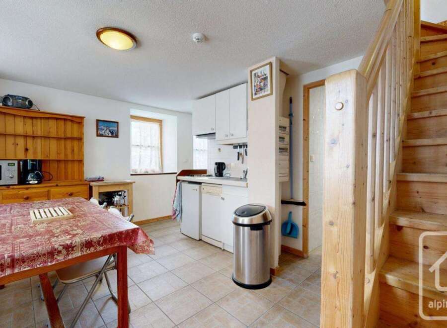 Discover the charm of this cozy property, featuring a well-equipped kitchen with modern appliances and ample storage.