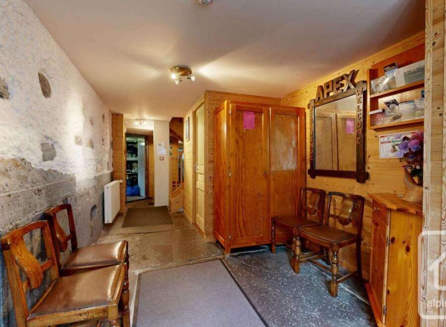 Step into this charming property and discover a warm and inviting hallway.