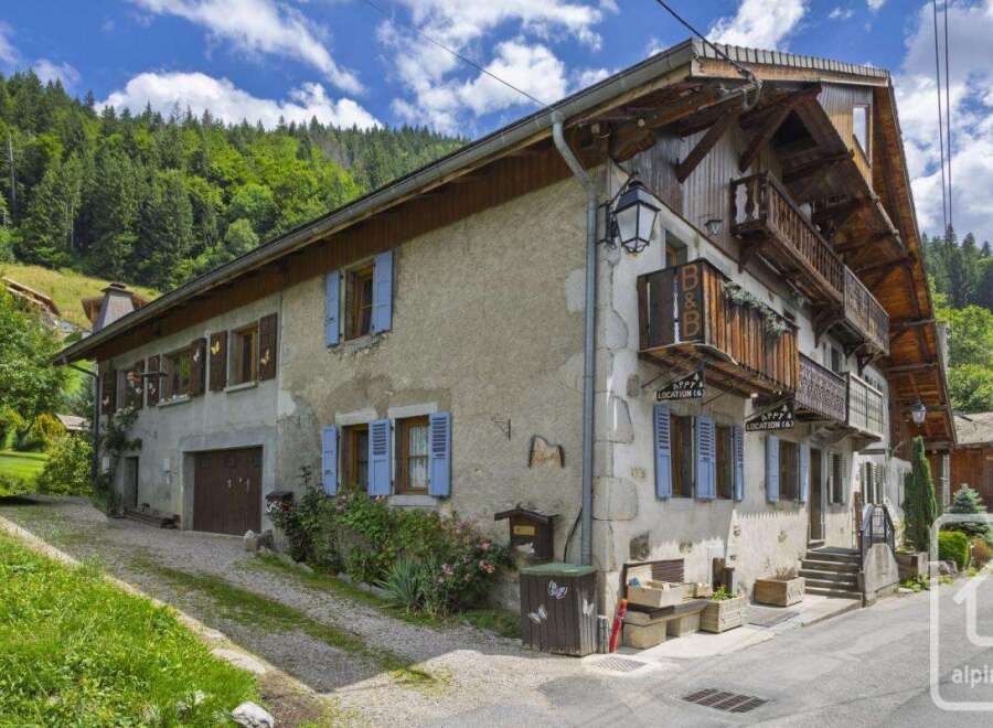Discover a charming B&B nestled in a picturesque mountain setting.