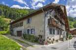 Discover a charming B&B nestled in a picturesque mountain setting.