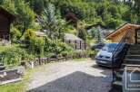 Discover a charming property nestled in a serene, natural setting.