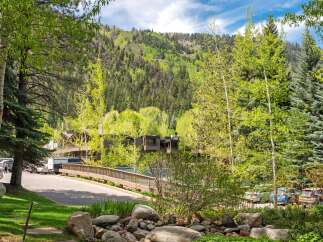 Nestled in a picturesque mountain setting, this property offers stunning views and a tranquil atmosphere.
