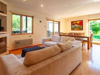 Step into a bright and inviting living space, perfect for relaxation and entertaining.