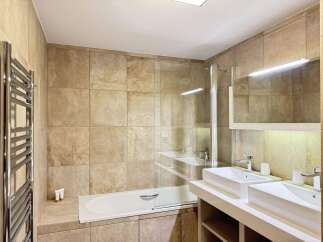 Step into a modern bathroom oasis.