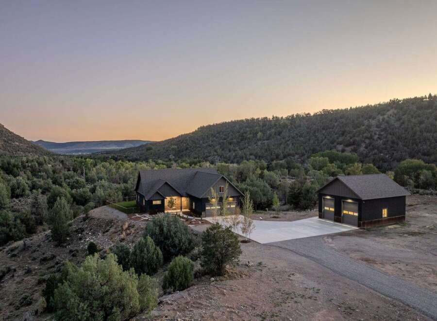 Nestled in a serene landscape, this stunning property offers a perfect blend of modern design and natural beauty.