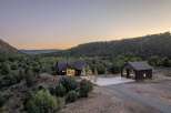 Nestled in a serene landscape, this stunning property offers a perfect blend of modern design and natural beauty.