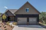 This stunning property boasts a modern design with a focus on curb appeal.