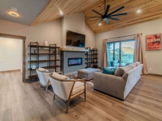 Experience luxury living in this stunning property featuring a cozy fireplace, perfect for chilly evenings.
