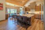 This stunning kitchen boasts a spacious island with seating, perfect for entertaining.